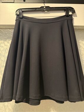 bebe Black A-Line Skirt with Flared Silhouette
